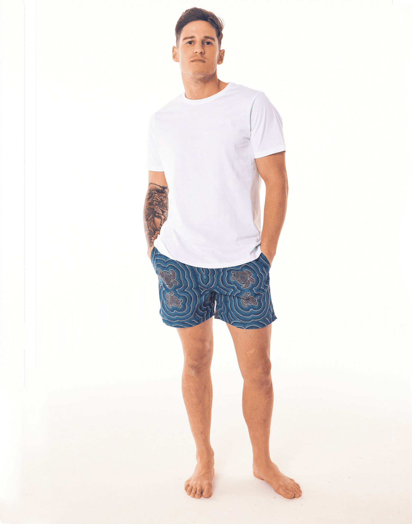 Eco-Friendly Dot art turtle Print Mens' Shorts by SevenC's - Front view on model with White T-shirt