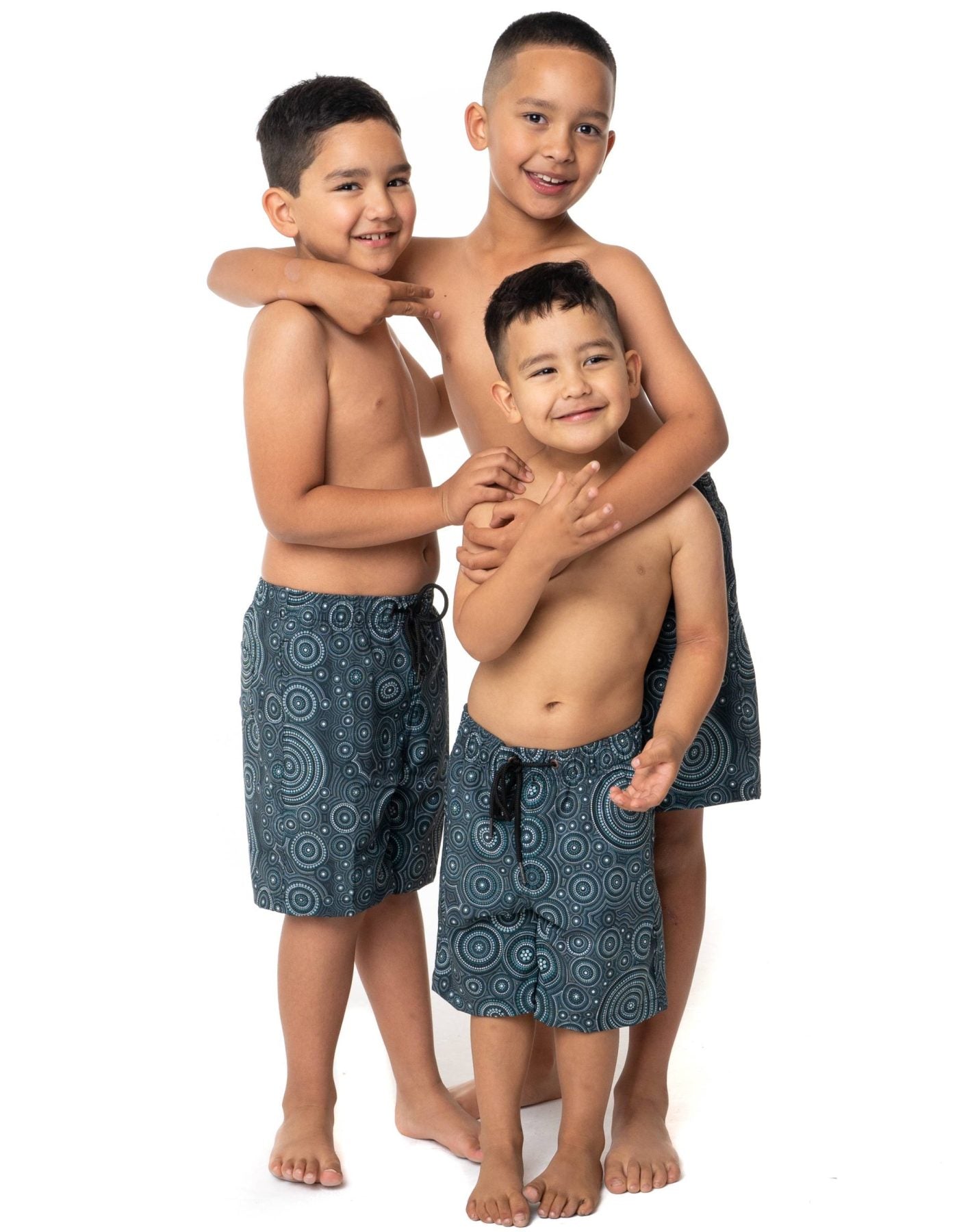 Three kids in Dreaming pattern SevenC's Eco-friendly swimwear