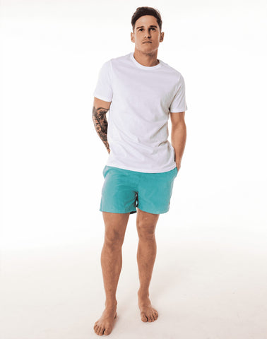 SevenC's Men's Recycled Polyester Shorts in Blue - on model with white t-shirt