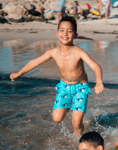 Sustainable Men's Whaleshark Print Shorts from SevenC's - Front View on model at beach